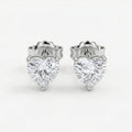 HeartGlow Silver Stud Earrings