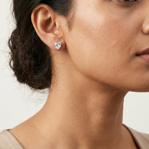 HeartGlow Silver Stud Earrings