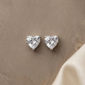 HeartGlow Silver Stud Earrings